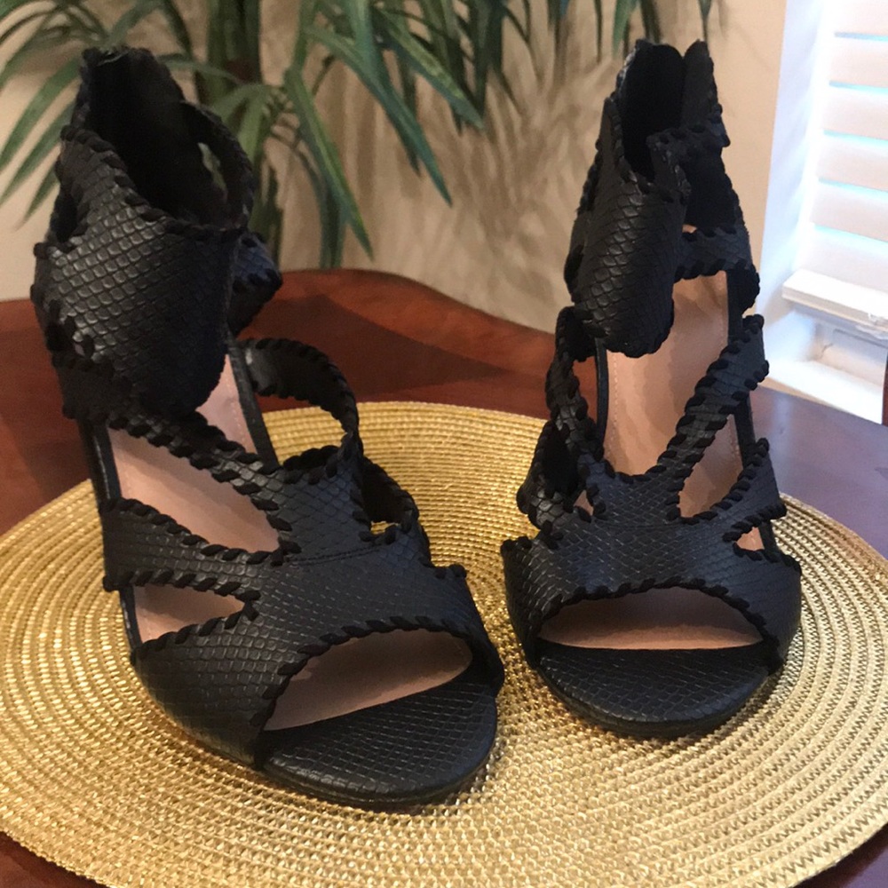 Black Pumps with strap.